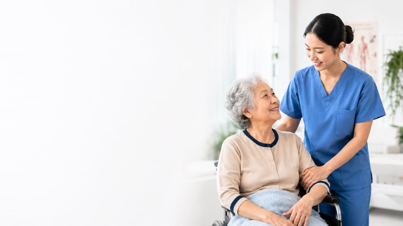 Nursing aide caring for an elderly patient in a care setting